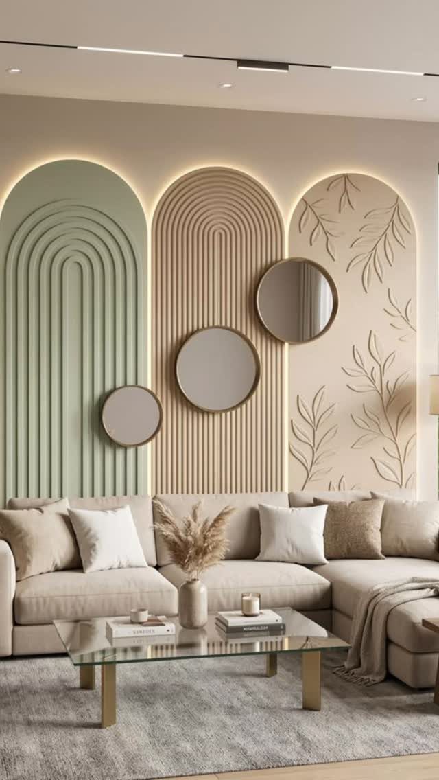 Decorative arched wall panels with fluted textures and botanical patterns behind a beige sectional sofa.