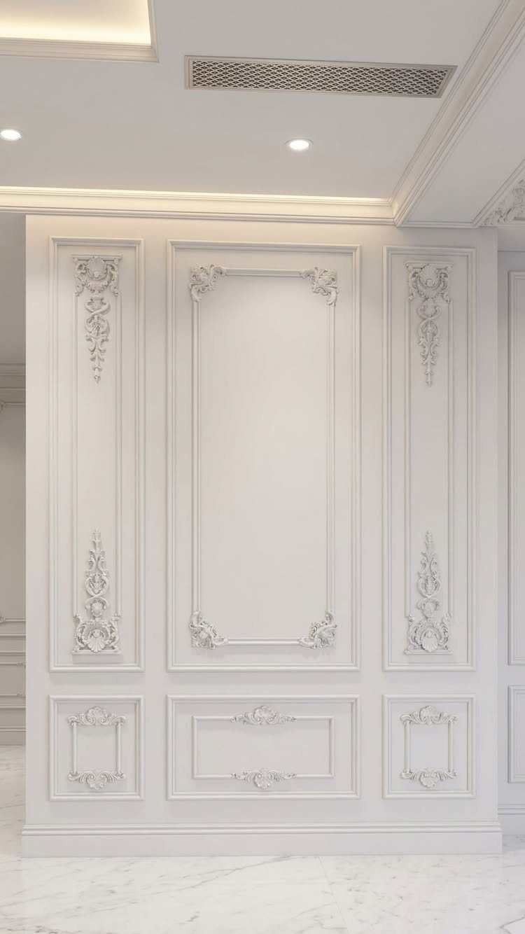Decorative Wall Molding: 7 Panel Styles for Every Room 4 Ornate white wall molding with decorative floral carvings on large rectangular panels.