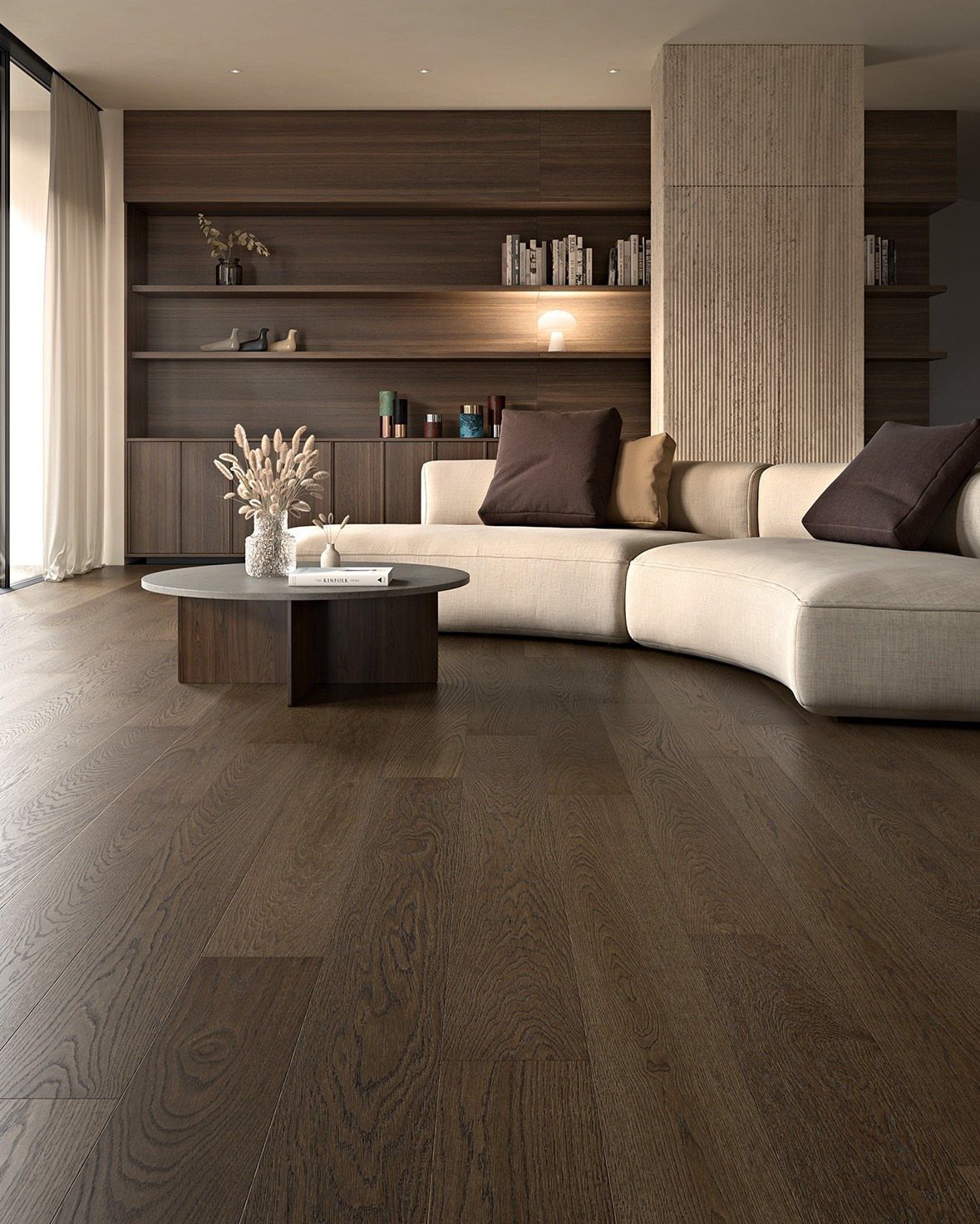 Most Popular Coretec Colors: 8 Best-Selling Flooring Picks 8 Dark brown wood plank flooring in a modern living room with a cream sofa.